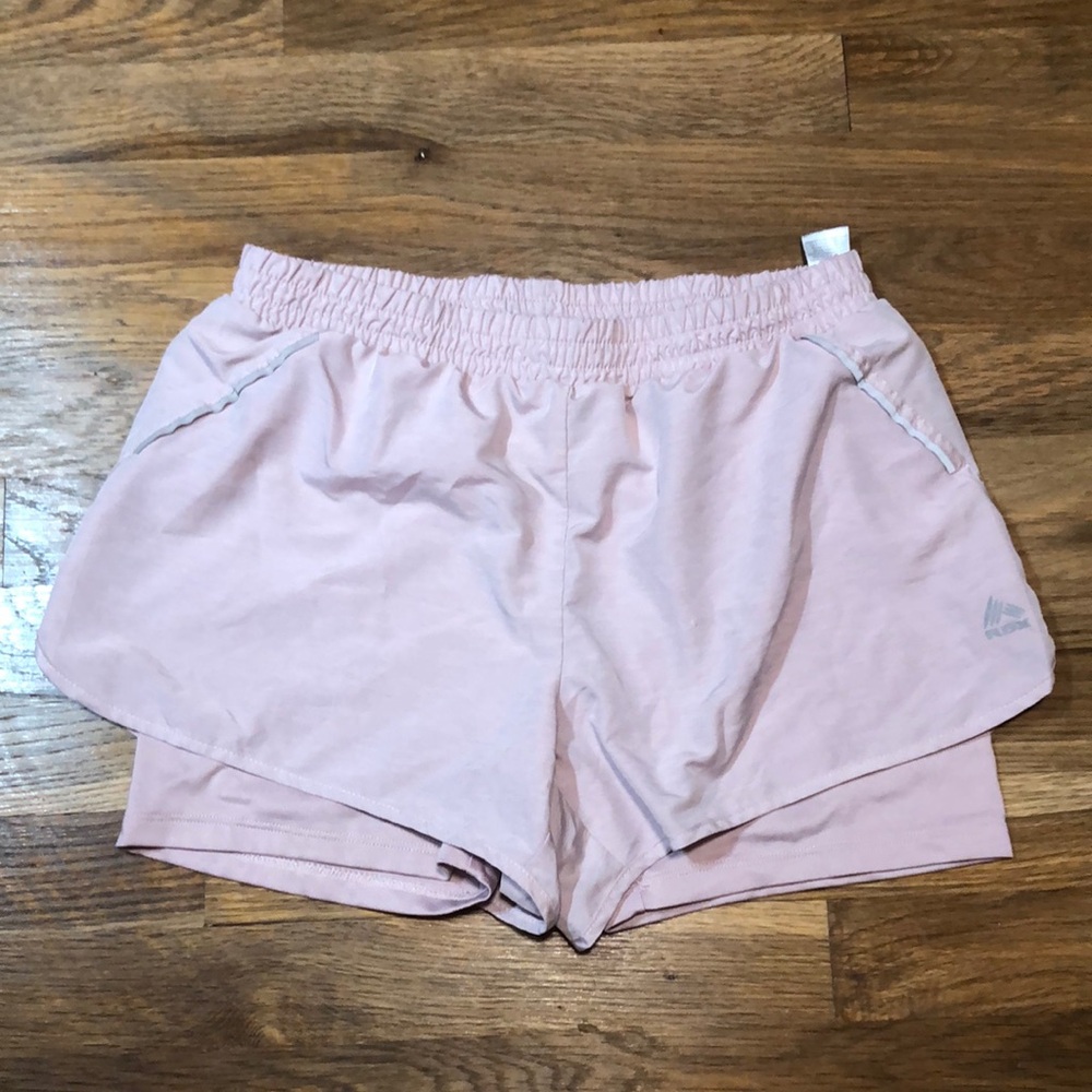 REEBOK pink performance running shorts